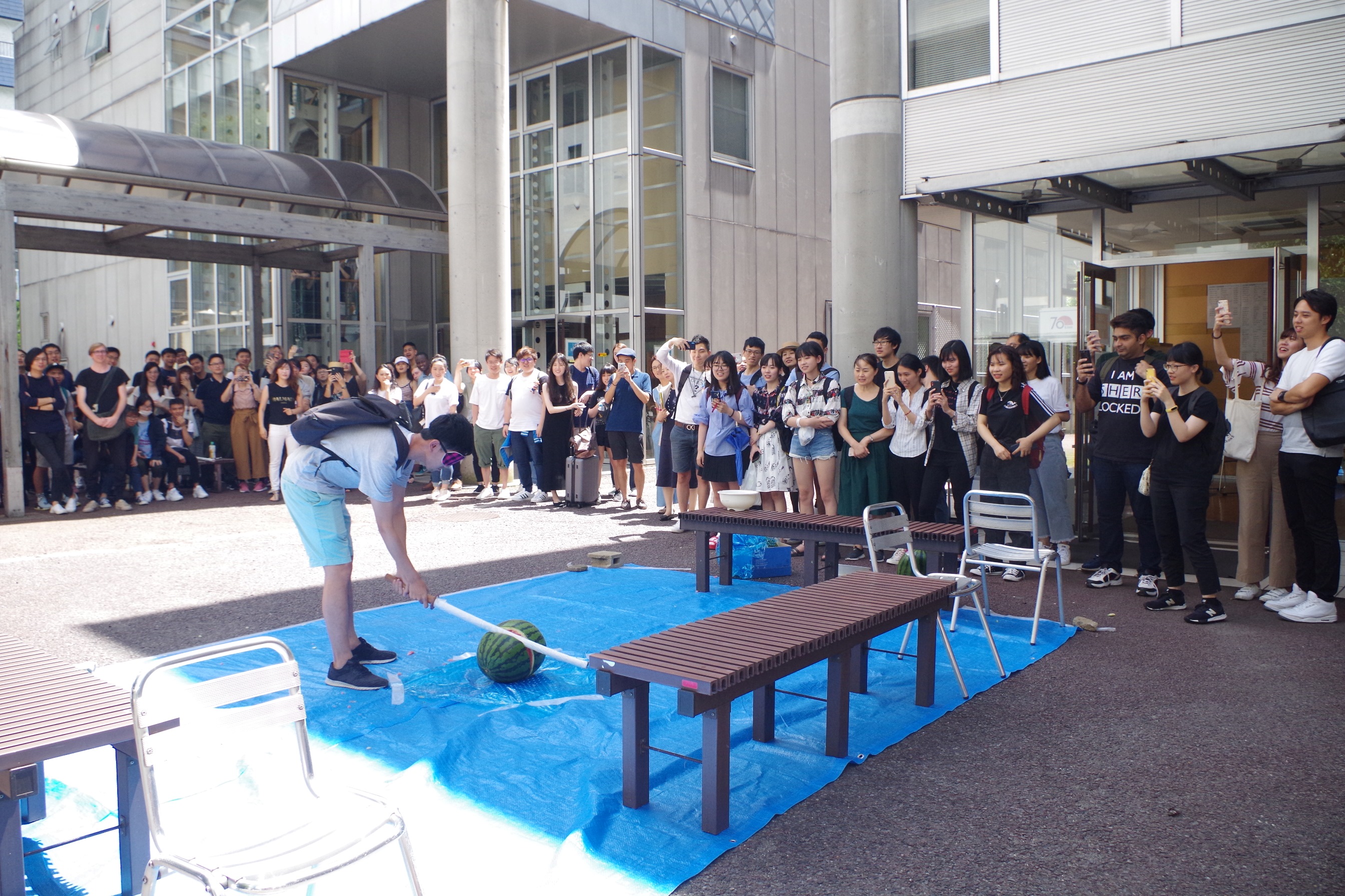 Naganuma School students enjoying suikawari game
