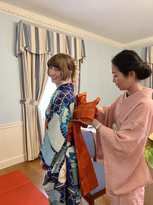 Students trying on Japanese costume