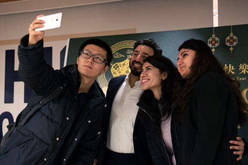 Group of students taking a selfie during a Lunar New Year celebration